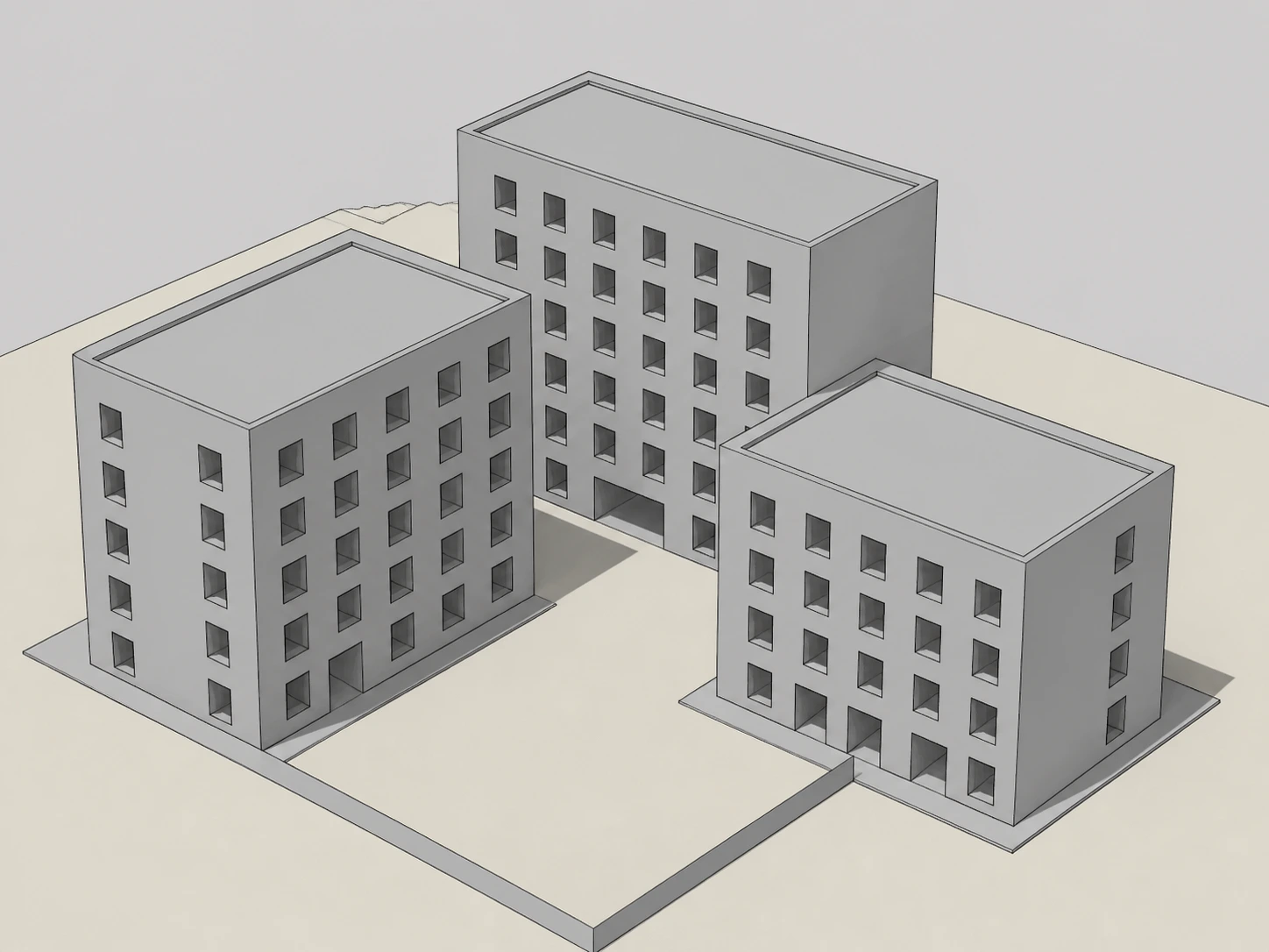 SketchUp massing model of three simple apartment blocks arranged around a shared courtyard with plain grey materials